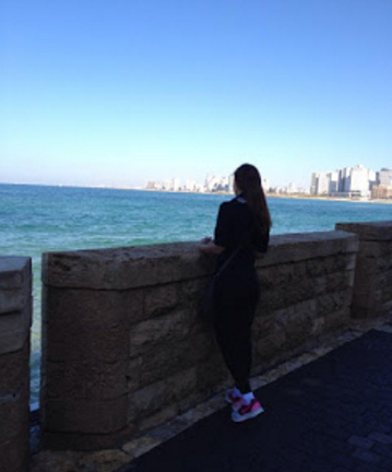 Mirit Hadar at sea wall Israel