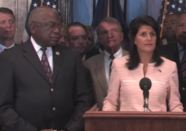 Image via this video of Haley's press conference calling for the Confederate flag to come down in SC - 6/22/15. https://youtu.be/fjeyUXJv84c - uploaded 3/7/19 by Stacey.
